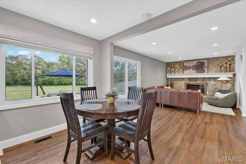 Convenient breakfast area connects the kitchen to the cozy family room. — 15056 Isleview Drive, Chesterfield, MO 63017