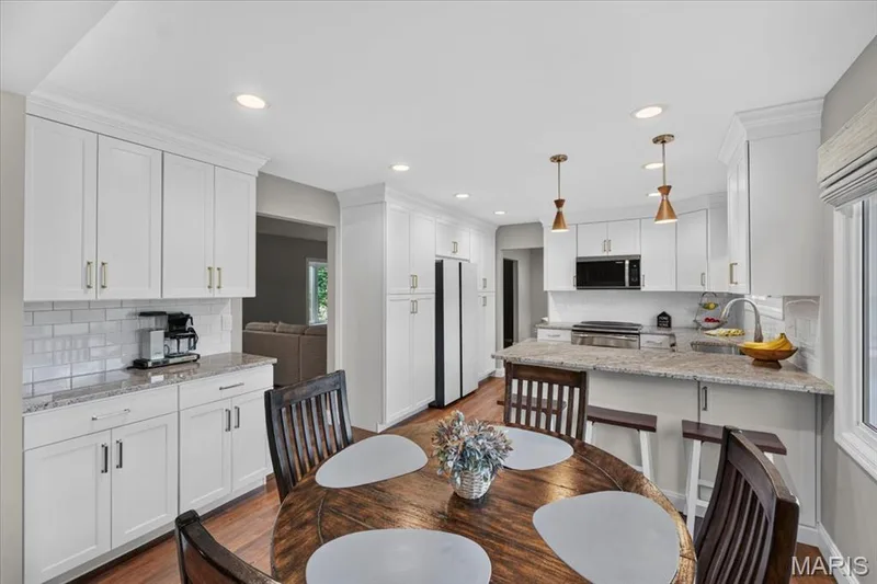 Additional counter space and cabinets along the wall. — 15056 Isleview Drive, Chesterfield, MO 63017
