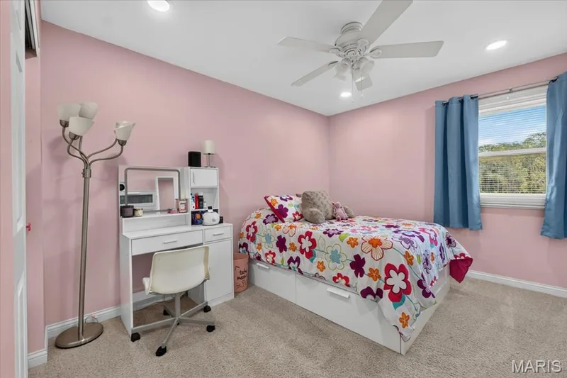 One of the three secondary bedrooms on the upper level. — 15056 Isleview Drive, Chesterfield, MO 63017