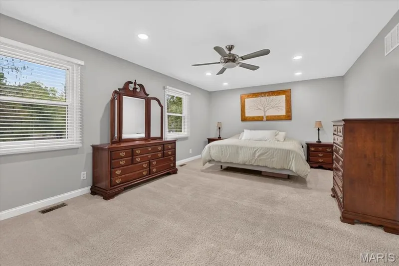 The primary bedroom suite with space to retreat and relax. — 15056 Isleview Drive, Chesterfield, MO 63017