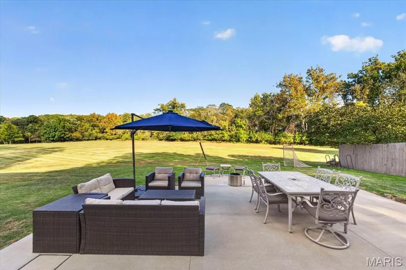 This backyard may be the real star - made for gathering and relaxing. — 15056 Isleview Drive, Chesterfield, MO 63017