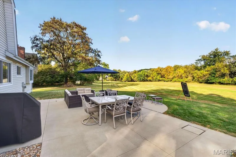 Room to dine, grill, and lounge in the spacious outdoors. — 15056 Isleview Drive, Chesterfield, MO 63017