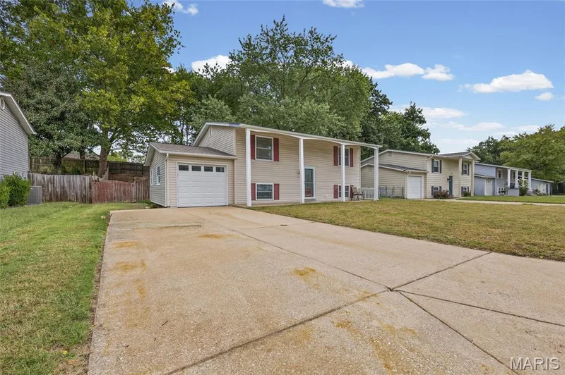 Concrete driveway to the attached garage. — 510 Keeney Drive, St Charles, MO 63304