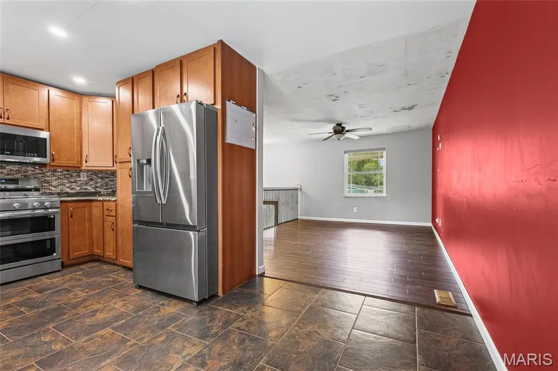 Kitchen opens to the living room. — 510 Keeney Drive, St Charles, MO 63304