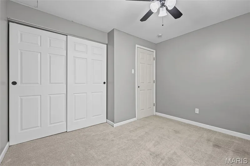 Bedroom 2 closet and ceiling fan. — 510 Keeney Drive, St Charles, MO 63304