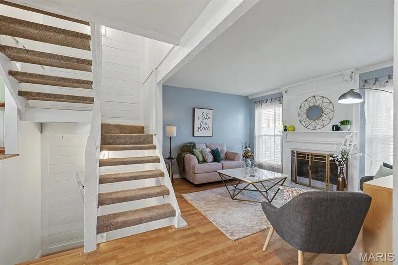 Wood-finish flooring throughout the main level — 81 Schooner Lane #1, Lake St. Louis, MO 63367