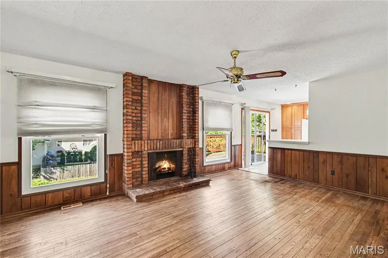 Convenient deck located off the kitchen and family room with access to flat, level backyard. — 2311 Blue Hill Road, Chesterfield, MO 63017