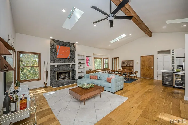 Great Room opens to Dining and Kitchen — 1302 Bear Canyon Road, Wildwood, MO 63021