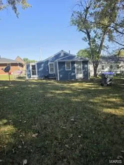 Large...long (but narrow) yard.  Lots of room for games, bar-b-queing, hang out and play. — 304 W Pitman Street, O'Fallon, MO 63366