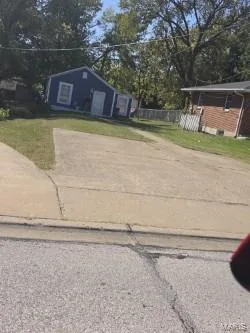 Large double car parking pad in front of home. — 304 W Pitman Street, O'Fallon, MO 63366