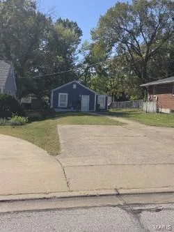 Blue exterior siding with white trim — 304 W Pitman Street, O'Fallon, MO 63366