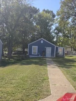 This home has a long narrow lot and is set back in between two homes ....great yard! — 304 W Pitman Street, O'Fallon, MO 63366