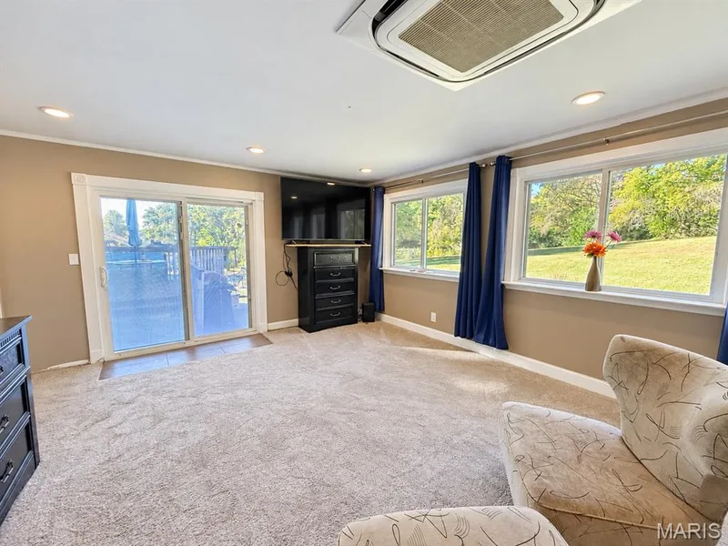 Slider w/ built in blinds leading out to the deck and park like back yard — 111 Valvero Drive, St Charles, MO 63304