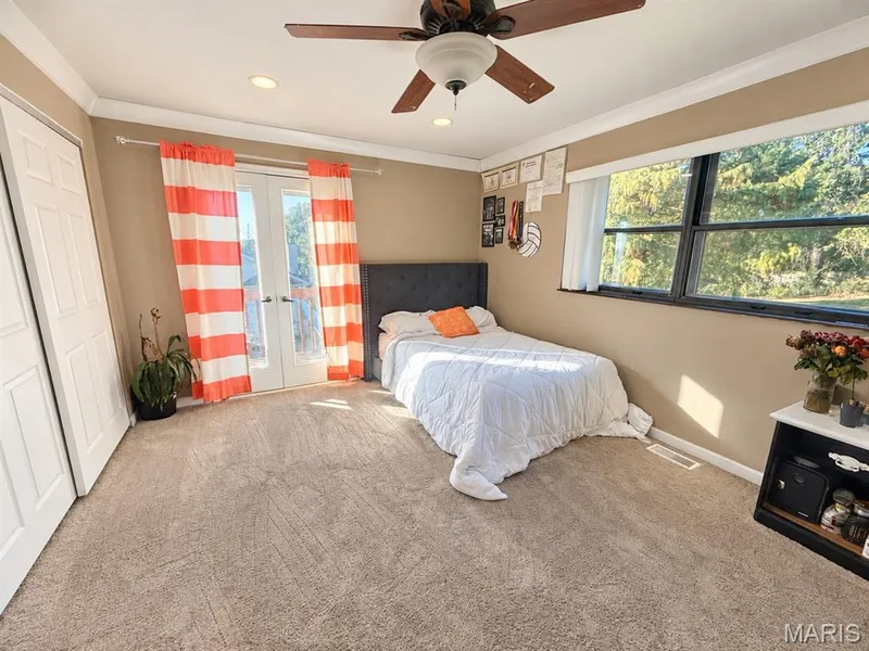 Secondary primary w/ French doors leading out to a Juliette Balcony overlooking the pool — 111 Valvero Drive, St Charles, MO 63304