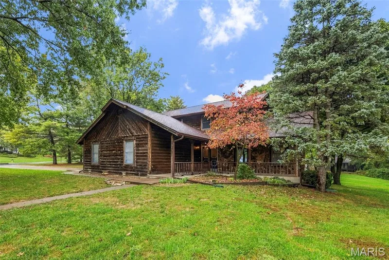Nestled on close to a half acre lot — 29 Number Six Green Drive #A, St Charles, MO 63303