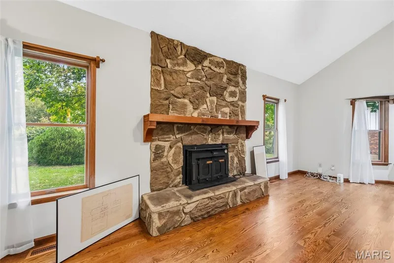 Stone wood fireplace-heats the room! — 29 Number Six Green Drive #A, St Charles, MO 63303