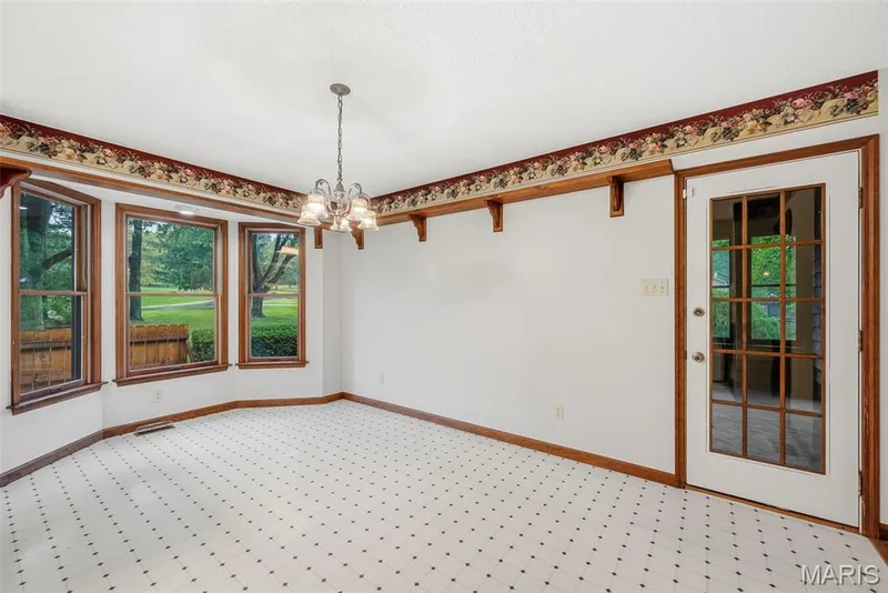 Breakfast room with a bay window — 29 Number Six Green Drive #A, St Charles, MO 63303