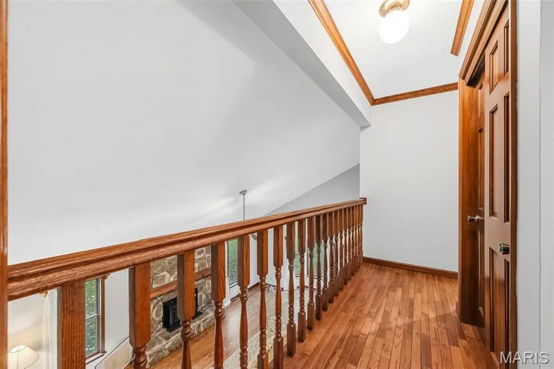 Overlooking lower level great room — 29 Number Six Green Drive #A, St Charles, MO 63303