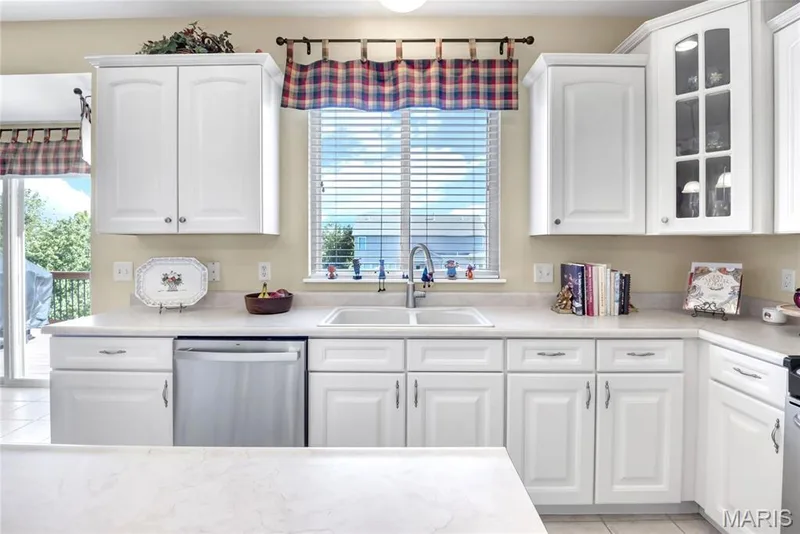 Kitchen window overlooking deck and back yard — 2061 Avalon Mist Circle, Dardenne Prairie, MO 63368