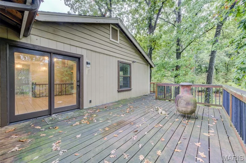 Step out of the dining area  to your large deck. — 533 Snipes Drive, St Charles, MO 63303