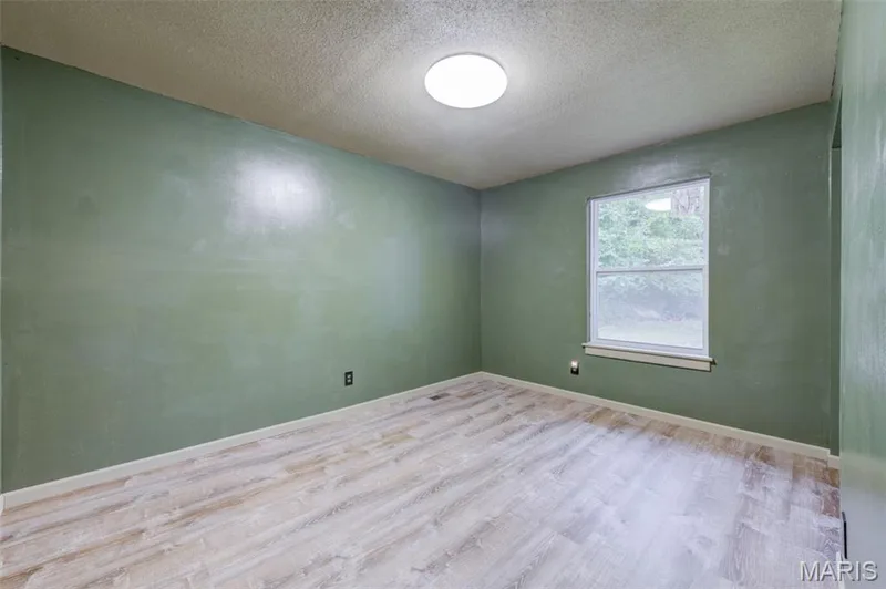 2nd Bedroom decorated in Kaki colors for the little hunter — 533 Snipes Drive, St Charles, MO 63303