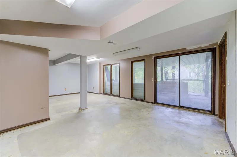 Lower Level Family Room - concrete floors — 533 Snipes Drive, St Charles, MO 63303