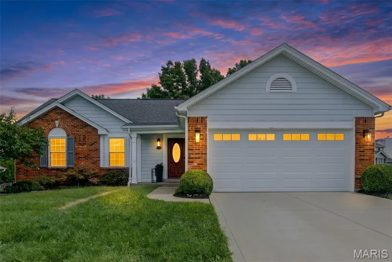 Brick and siding exterior with a gabled roof — 1094 Harness Drive, St Charles, MO 63304
