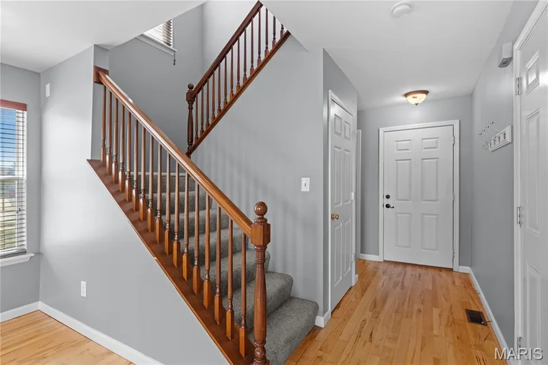As you enter, the stunning architecture greets you with thoughtfulness & convenience at every turn! — 819 Country Field Drive, Lake St. Louis, MO 63367
