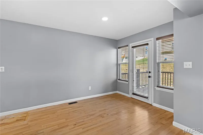 Large Eat in Kitchen with easy access right outside to the spacious deck for outdoor living! — 819 Country Field Drive, Lake St. Louis, MO 63367