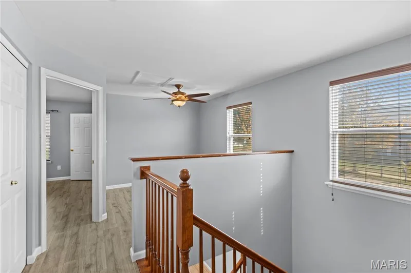 Upstairs, you will love the bonus loft area making a great work from home office space or sitting room book nook! — 819 Country Field Drive, Lake St. Louis, MO 63367