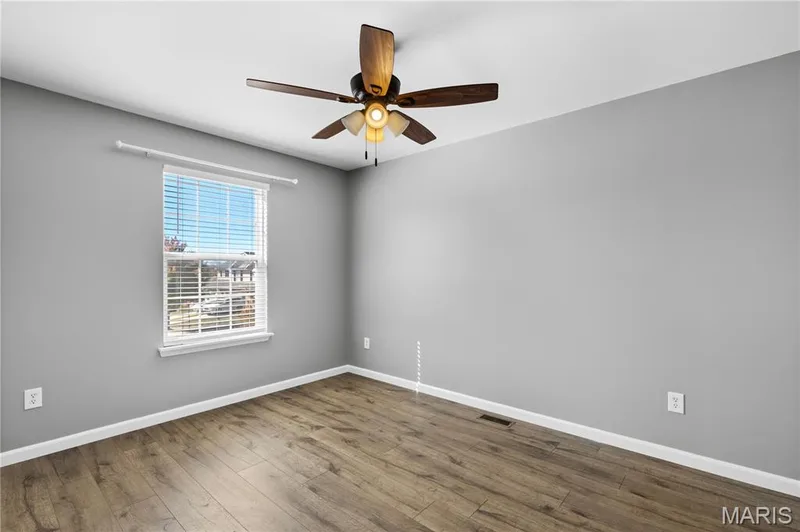 Spacious second bedroom with tons of natural light! — 819 Country Field Drive, Lake St. Louis, MO 63367