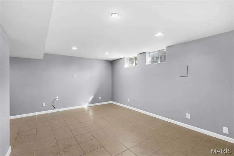 Lower Level has a finished Rec Room which could also be a Media Room, Game Room, Theatre Room or even a sleeping area... you choose! — 819 Country Field Drive, Lake St. Louis, MO 63367