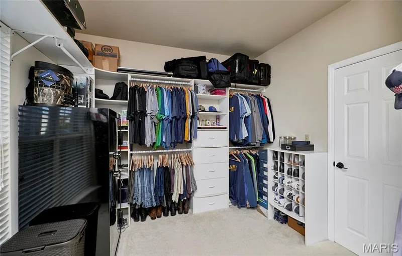 HUGE primary suite closet features an abundancce of storage space — 7428 Heathermoor Lane, Dardenne Prairie, MO 63368