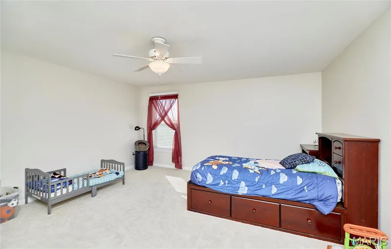 Bedroom 2 at back of home offers a large walk in closet with access to the jack & Jill bath — 7428 Heathermoor Lane, Dardenne Prairie, MO 63368