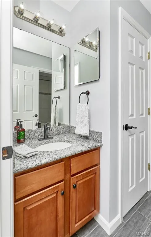 Separate vanities in the jack and jill bath — 7428 Heathermoor Lane, Dardenne Prairie, MO 63368