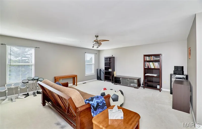 Upper level bonus room is sure to please offering additional living space for the kids! — 7428 Heathermoor Lane, Dardenne Prairie, MO 63368