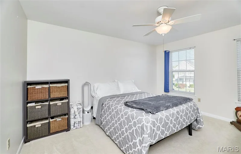 Bedroom 4 at front features a ceiling fan and large walk in closet — 7428 Heathermoor Lane, Dardenne Prairie, MO 63368