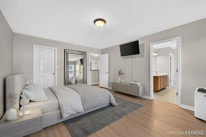 Primary Bedroom Virtually Staged — 203 Sword Lily Drive, O'Fallon, MO 63366