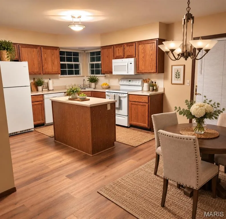 Virtually staged kitchen — 824 Brookwood Bend Trail, St Peters, MO 63376