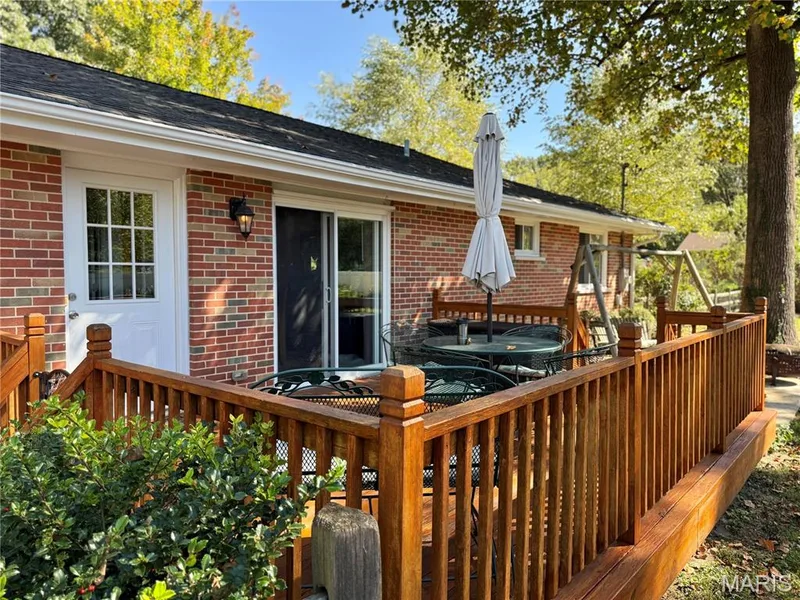 Sliding glass doors from dining room out to deck also a door from the kitchen to the deck area. — 35 Connie Drive, St Charles, MO 63301