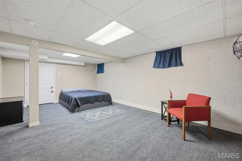 Lower level bonus room, great area for another sleeping area, hobby area, workout area or office — 35 Connie Drive, St Charles, MO 63301