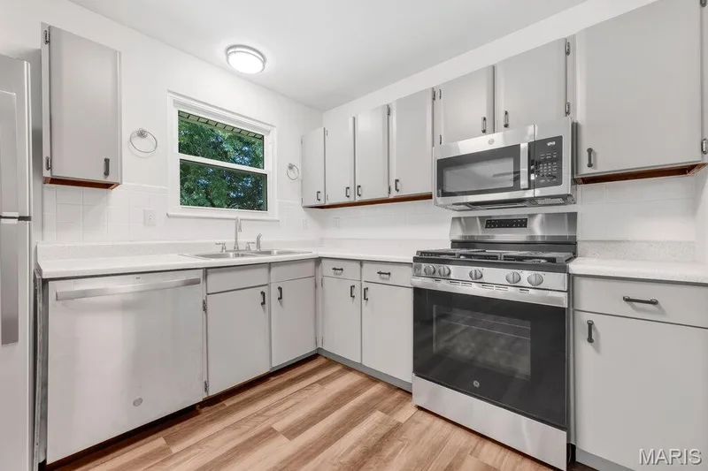 Updated with new appliances vinyl plank flooring — 15 Country Hill Road, St Peters, MO 63376