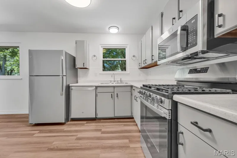 New Kitchen sink, faucet, lighting — 15 Country Hill Road, St Peters, MO 63376