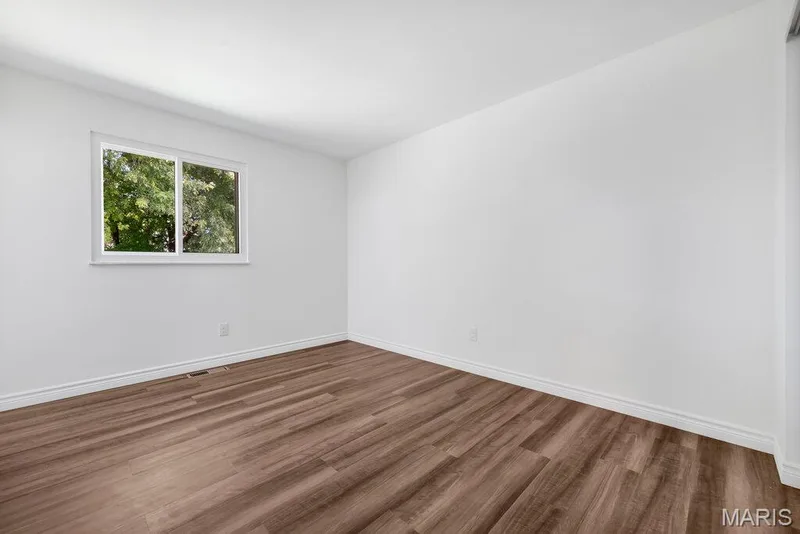 Primary with new flooring, fresh paint, and new baseboards — 15 Country Hill Road, St Peters, MO 63376
