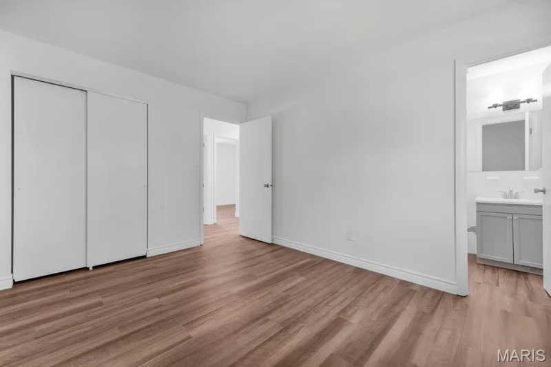 Primary with new flooring, fresh paint, and new baseboards and a half bath — 15 Country Hill Road, St Peters, MO 63376