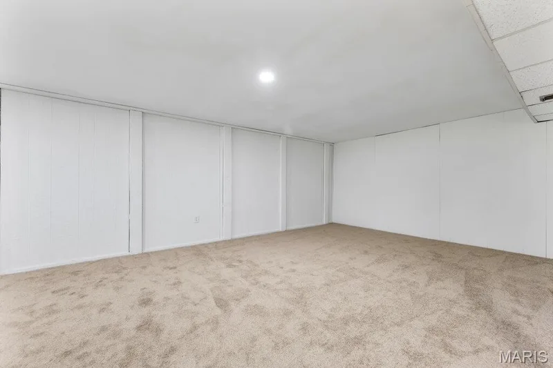 Lower level rec room with new carpeting and freshly painted — 15 Country Hill Road, St Peters, MO 63376