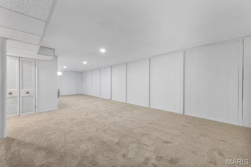 Lower level rec room with new carpeting and freshly painted — 15 Country Hill Road, St Peters, MO 63376