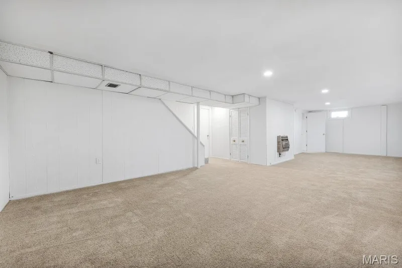 Lower level rec room with new carpeting and freshly painted — 15 Country Hill Road, St Peters, MO 63376