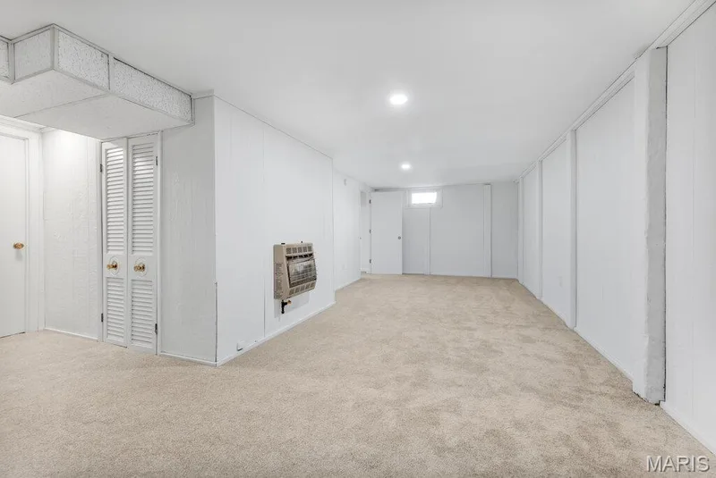 Lower level rec room with new carpeting and freshly painted — 15 Country Hill Road, St Peters, MO 63376