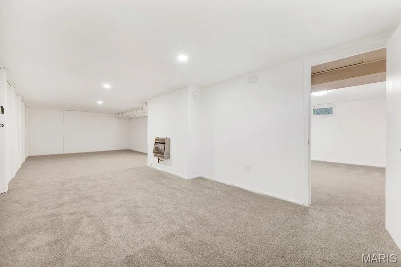 Lower level rec room with new carpeting and freshly painted — 15 Country Hill Road, St Peters, MO 63376